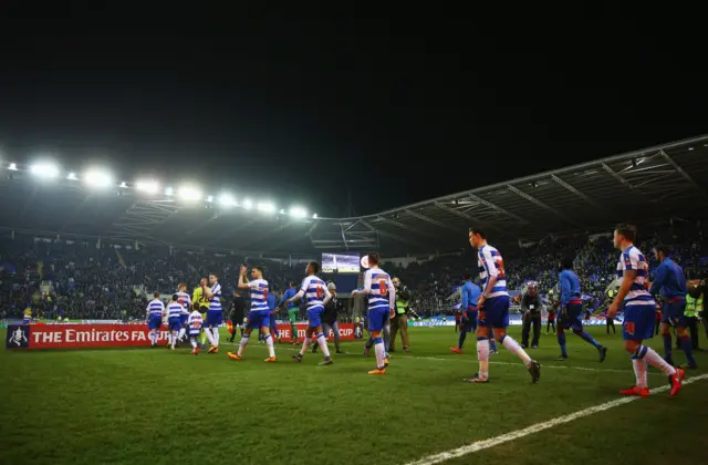 The players enter the pitch