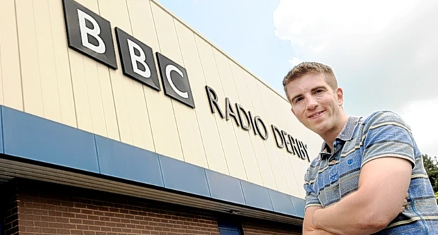 Colin Bloomfield outside BBC Radio Derby building which is being named after him