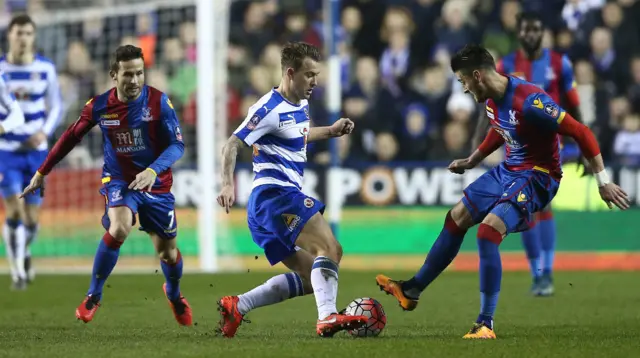 Simon Cox fights for the ball