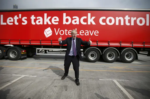 Boris Johnson in front of campaigning lorry