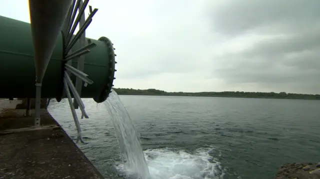 Water flowing out of pipe