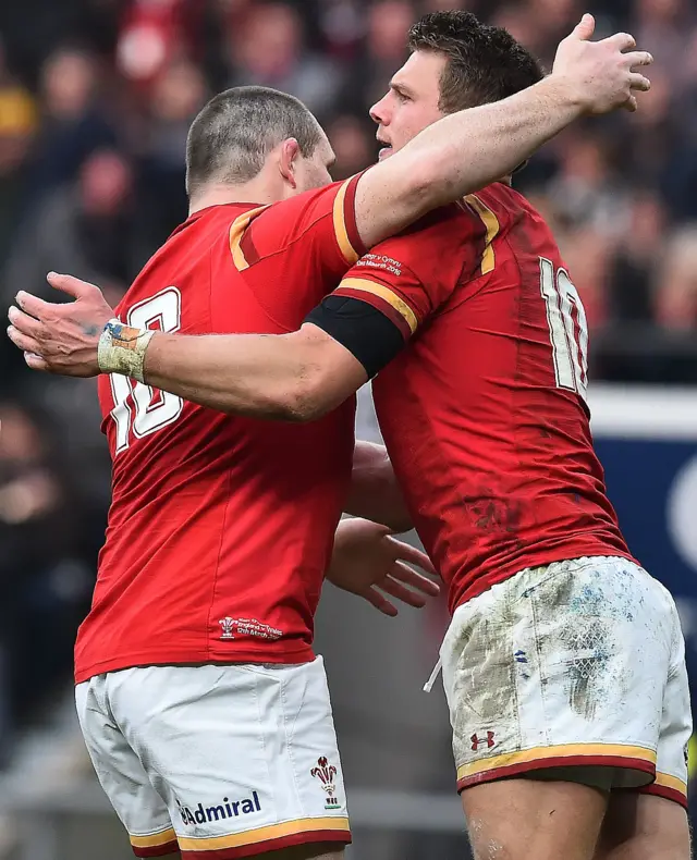 Dan Biggar and Ken Owens celebrate