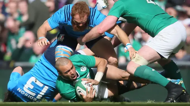 Ireland's Simon Zebo is tackled