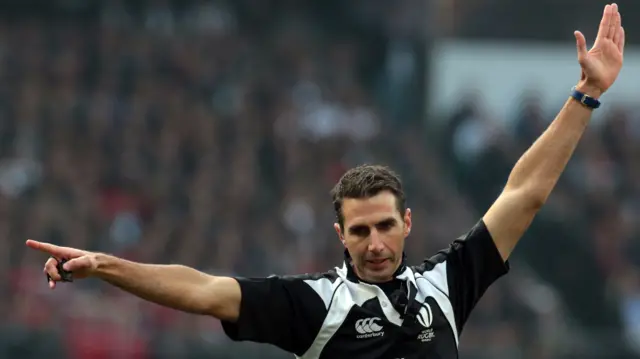 Referee Craig Joubert gives a penalty