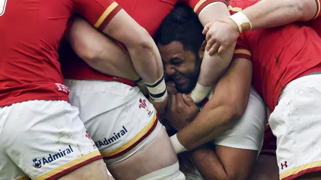 Billy Vunipola is tackled