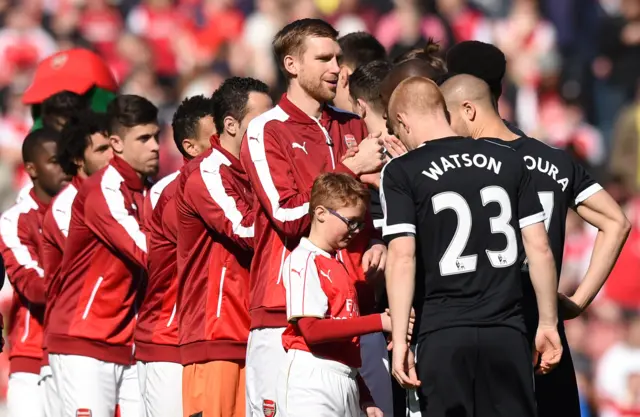 The Arsenal and Watford players before kick-off