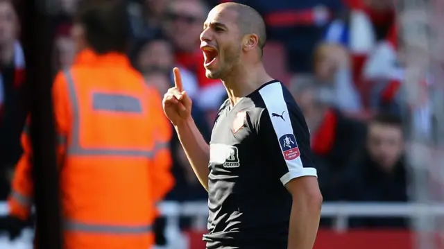 Adlene Guedioura celebrates his goal