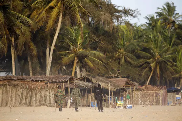 soldiers patrol on the beach