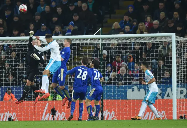 Kasper Schmeichel punches clear