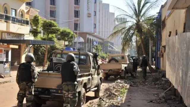 soldiers outside raddisson blu hotel during attack