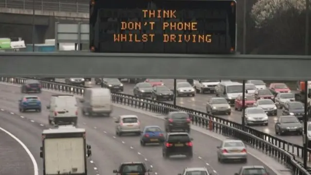 Motorway warning about mobile phone use while driving