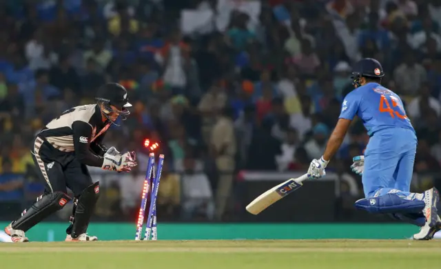 Rohit Sharma is stumped by New Zealand's Luke Ronchi