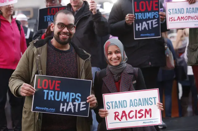 Members of MoveOn.org Political Action stand outside the studios of "Good Morning America"