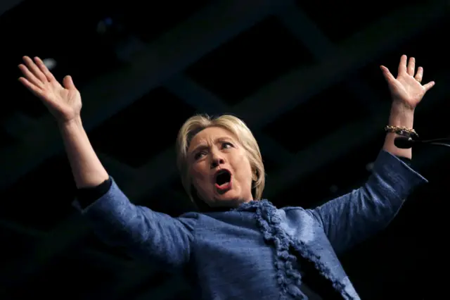 Democratic U.S. presidential candidate Hillary Clinton waves as she speaks to supporters at a campaign rally in West Palm Beach, Florida