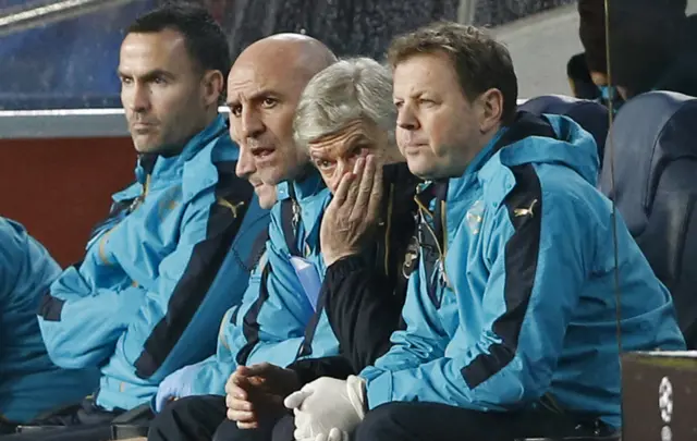 Arsene Wenger and his coaching team