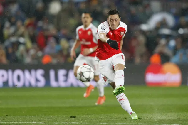 Mesut Ozil shoots