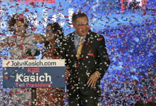 Republican U.S. presidential candidate Governor John Kasich and his family are surrounded by confetti