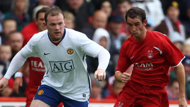 Wayne Rooney and Mark Kerr