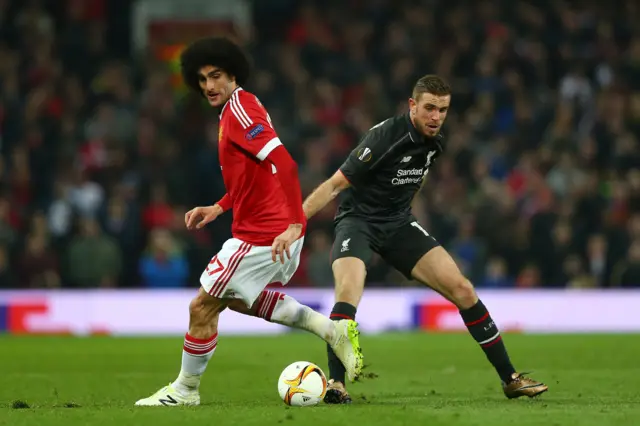 Marouanne Fellaini and Jordan Henderson