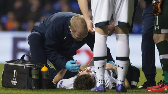 Tottenham's Ben Davies receives treatment