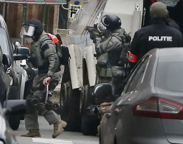 Police at the scene of a security operation in the Brussels suburb of Molenbeek in Brussels, Belgium