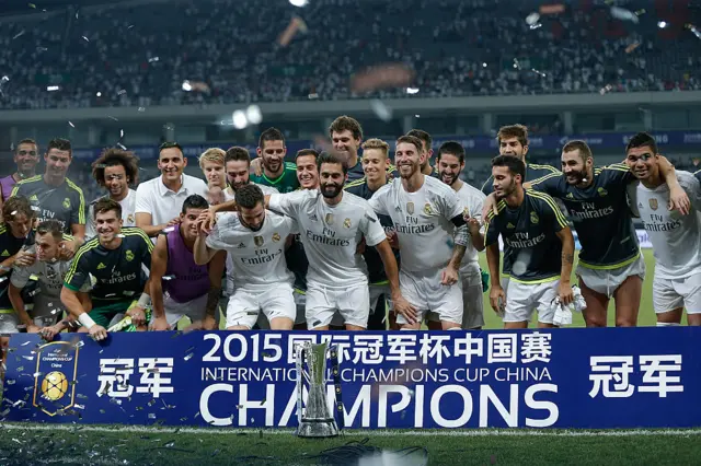 Real Madrid's players pose with the trophy after winning the International Champions Cup 2015