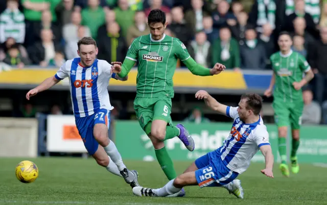 Celtic's Nir Bitton is shut down by Lee Hodson (left) and Conrad Balatoni.