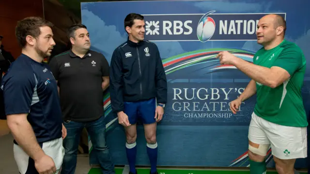 Scotland's Greig Laidlaw and Ireland's Rory Best toss the coin