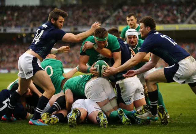 Ireland's CJ Stander dives over a ruck