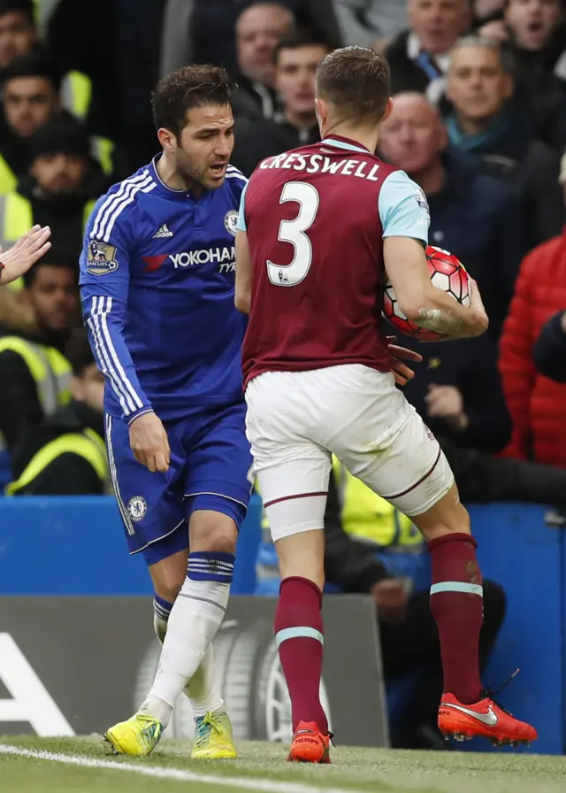 Cesc Fabregas argue with Aaron Cresswell