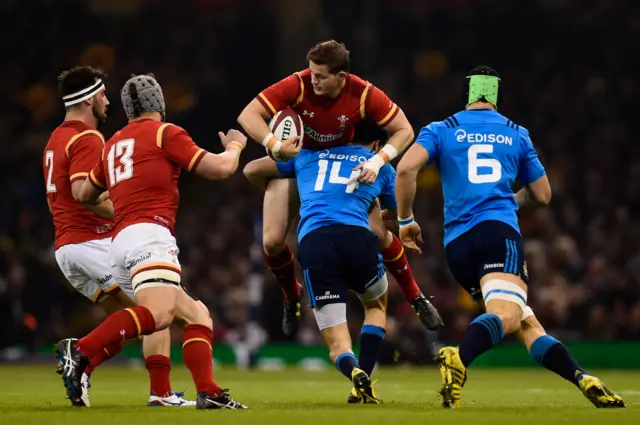 Wales' Hallam Amos is tackled