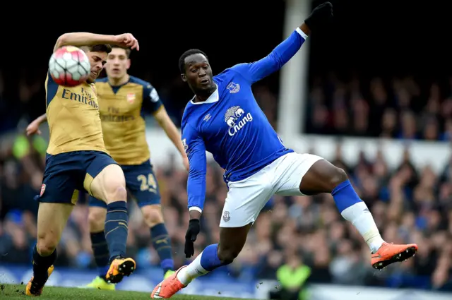 Gabriel slices the cross behind