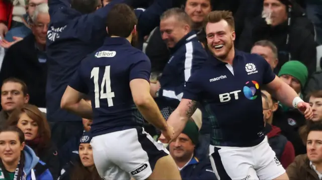 Stuart Hogg celebrates his try