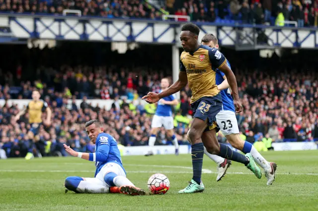 Ramiro Funes Mori tackles Danny Welbeck