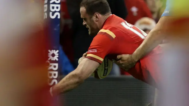 Jamie Roberts scores a try for Wales