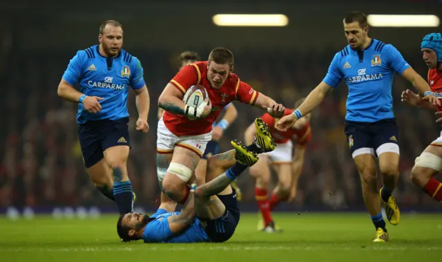 Dan Lydiate is tackled