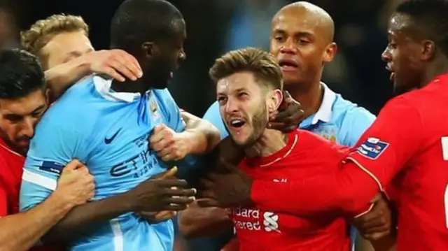 Adam Lallana squares up to Yaya Toure