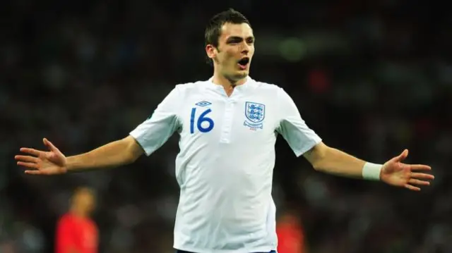 Adam Johnson playing for England