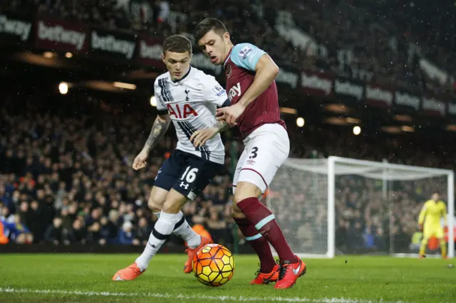 Kieran Trippier and Aaron Cresswell in action