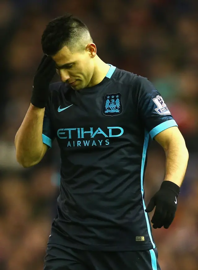 Sergio Aguero of Manchester City stands dejected