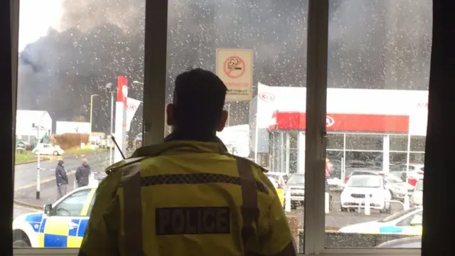 Policeman looking out of window at Stafford Rangers