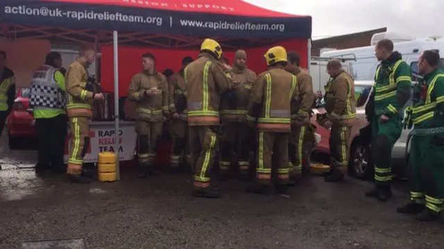 Lunch queue of emergency personnel