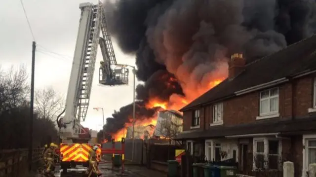 Aerial ladder platform battling fire