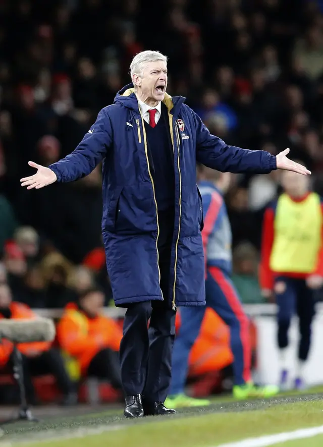 Arsene Wenger gestures