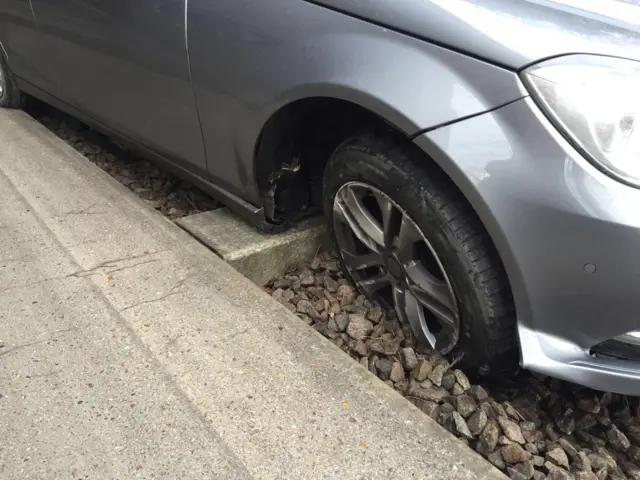 Car stuck on busway