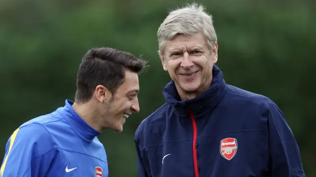 Arsene Wenger and Mesut Ozil