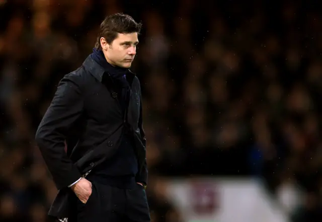 Mauricio Pochettino looks on