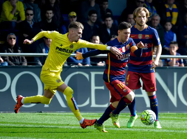 Lionel Messi runs with the ball