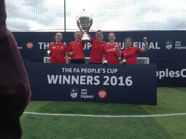 A town ladies with trophy