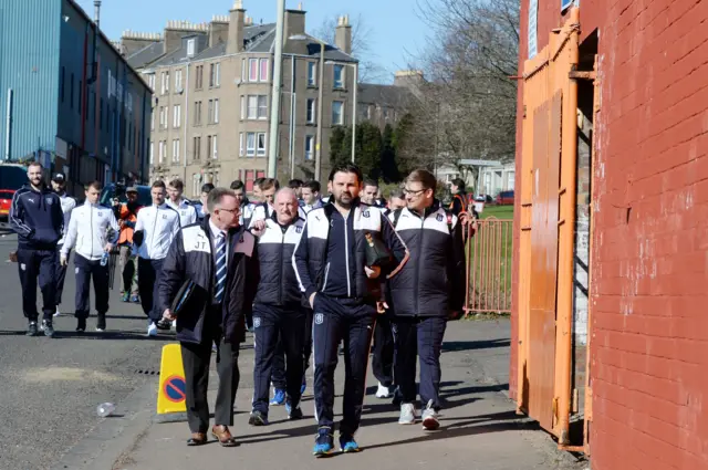 Dundee squad walk to Tannadice